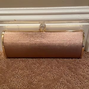 New bronze clutch with 2 handle sizes. 2 available.